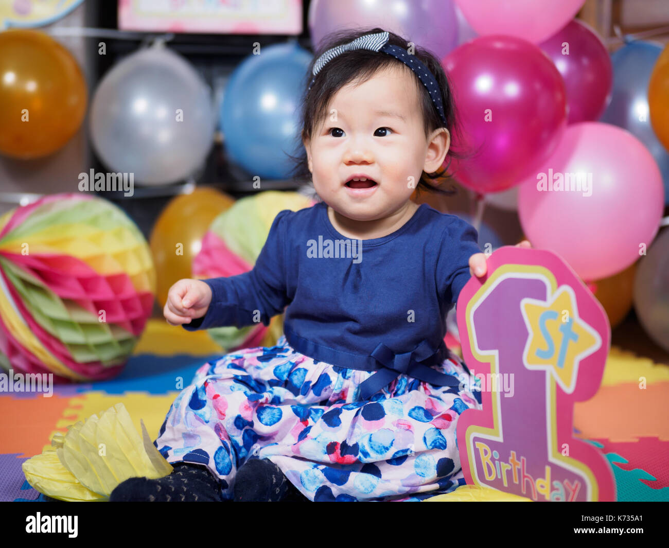 baby girl celebrate her first birthday Stock Photo Alamy