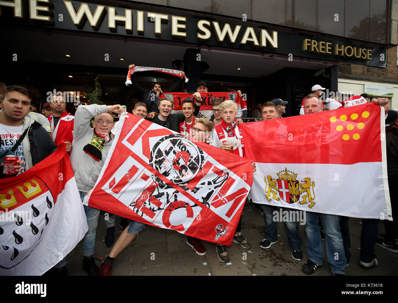 FC Koln fans outside The White Swan pub prior to the Europa League match at the Emirates Stadium, London. Stock Photo
