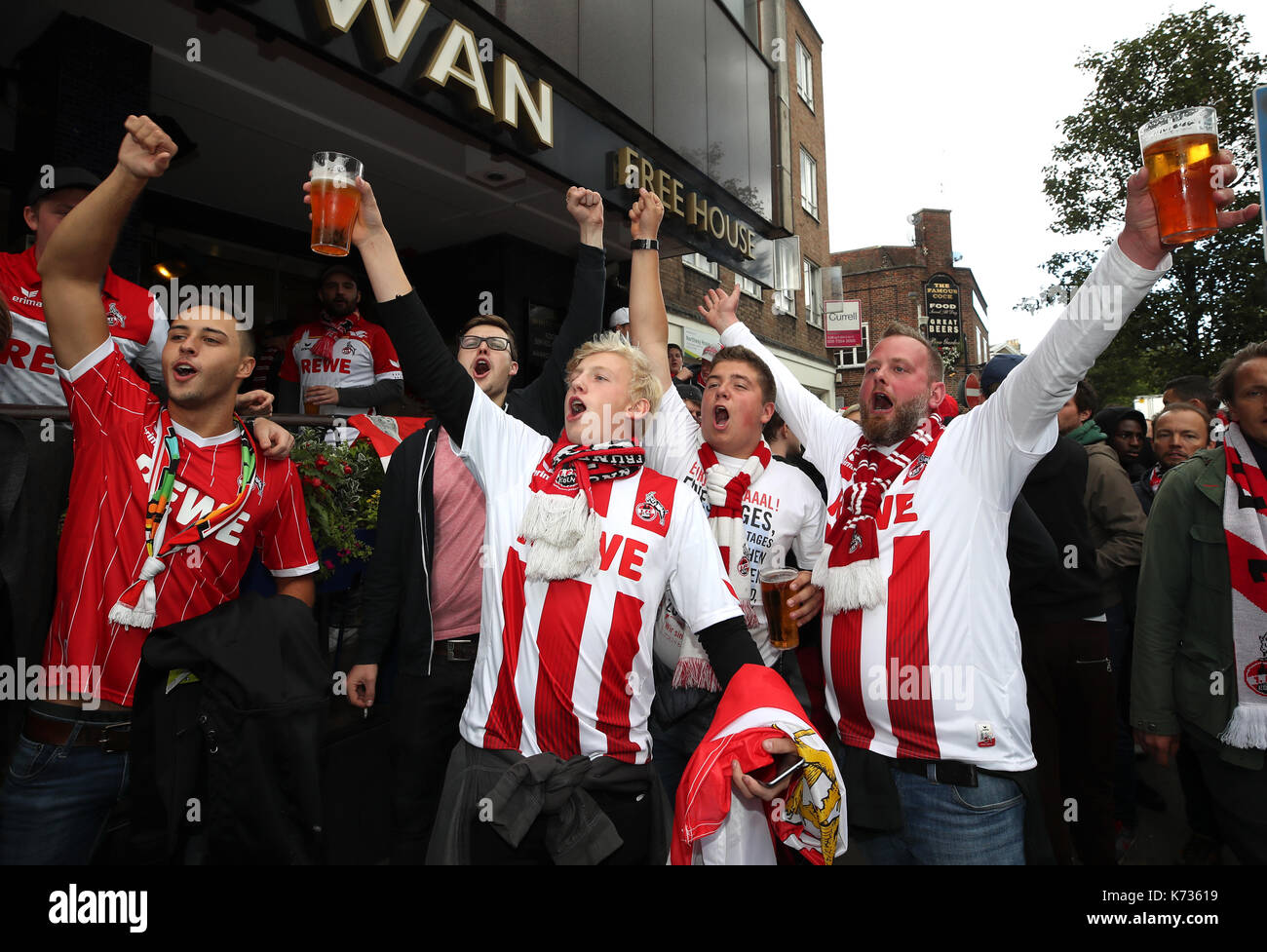 FC Koln fans outside The White Swan pub prior to the Europa League match at the Emirates Stadium, London. Stock Photo