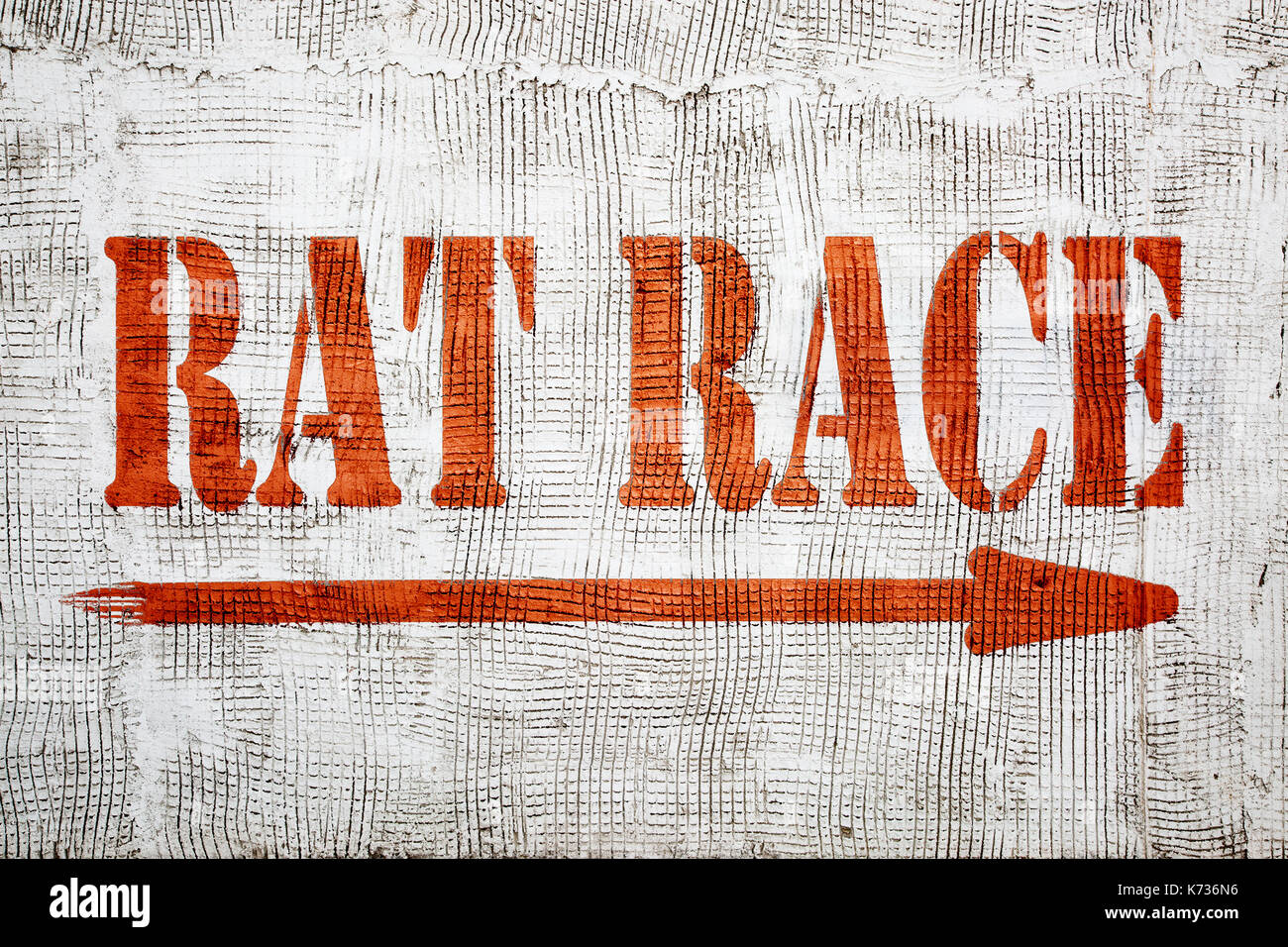 rat race - career and competition concept - graffiti sign on stucco ...