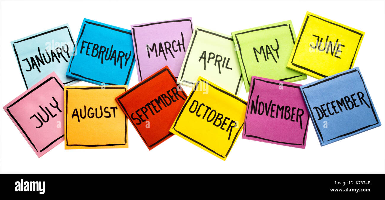 set of twelve months  (January, February, March, April, May, June, July, August, September, October, November, December) - handwriting in black ink on Stock Photo