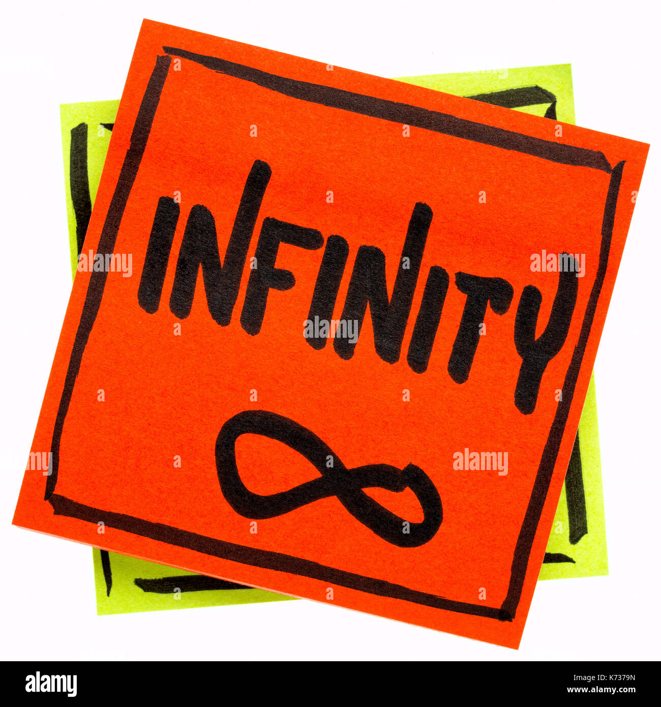 infinity word and symbol - handwriting on an isolated sticky note Stock Photo