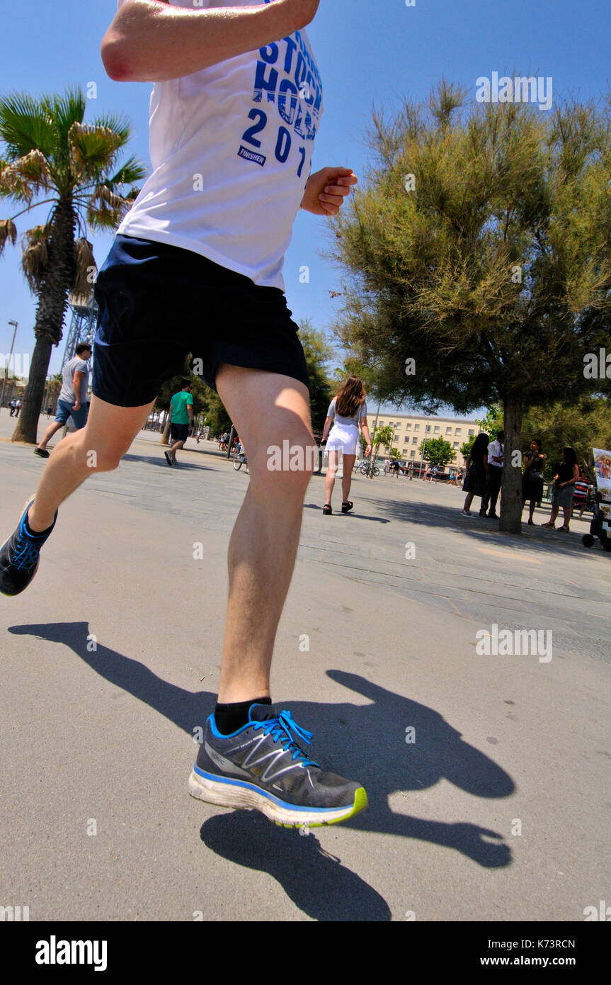 Urban athlete running, Barcelona, Catalonia, Spain Stock Photo