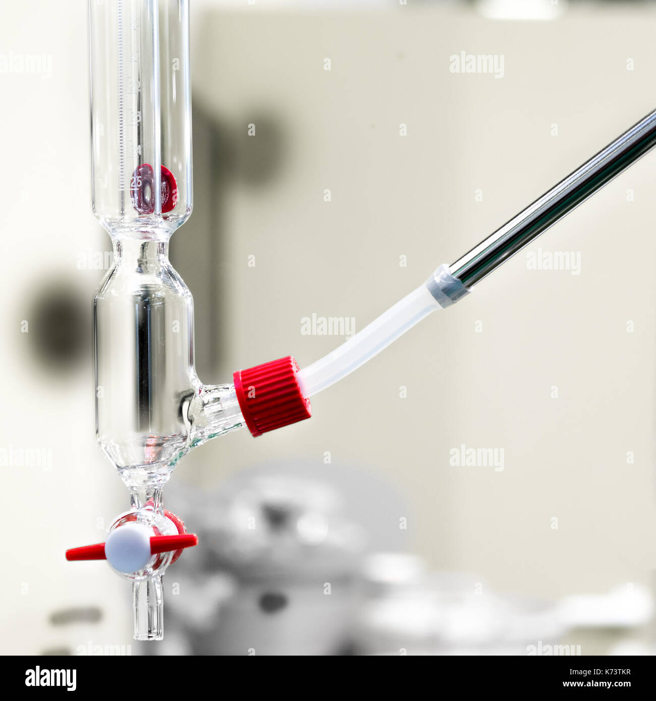 alchemical distiller closeup glass transparent spout doser measure drip alchemy Stock Photo