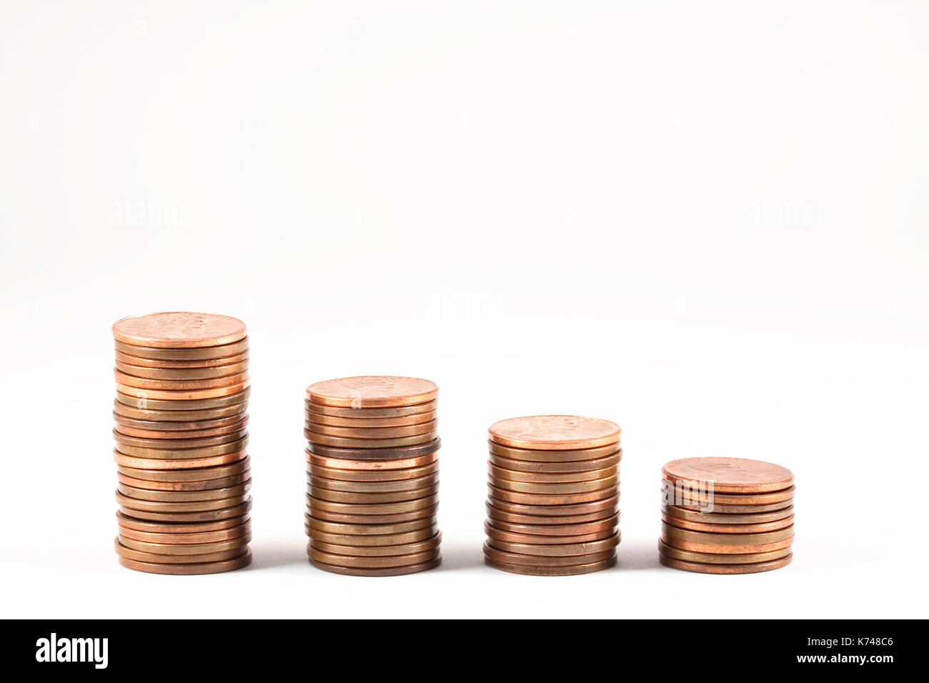 Stacks of pennies forming a graph Stock Photo