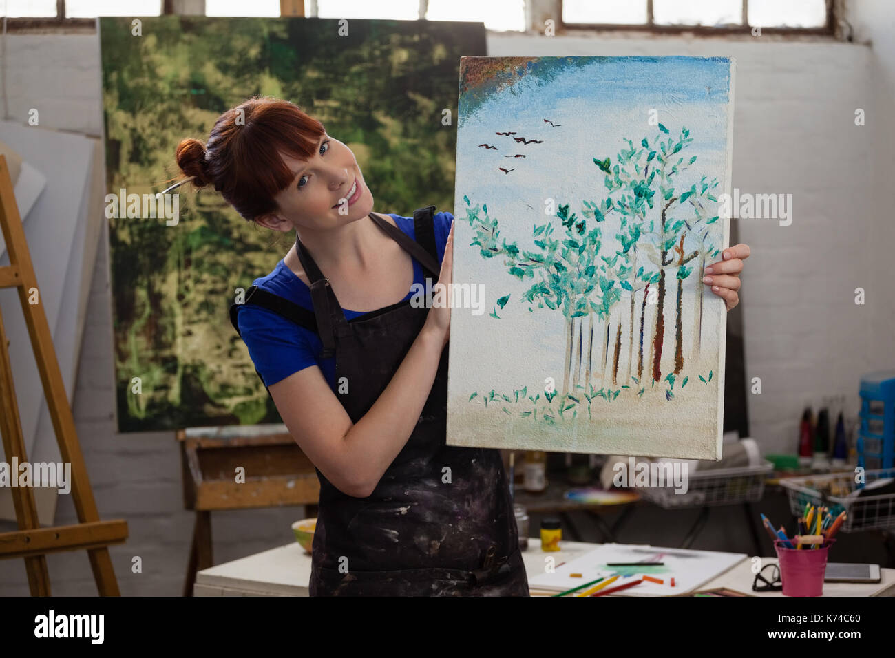 Beautiful female artist holding palette hi-res stock photography and ...