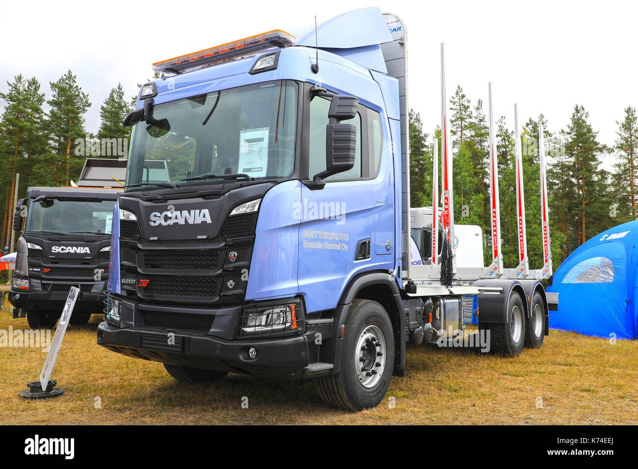 HYVINKAA, FINLAND - SEPTEMBER 8, 2017: Scania Suomi Oy presents the new Scania XT range, R650 for wood transport and G450 for construction, on Maxpo 2 Stock Photo