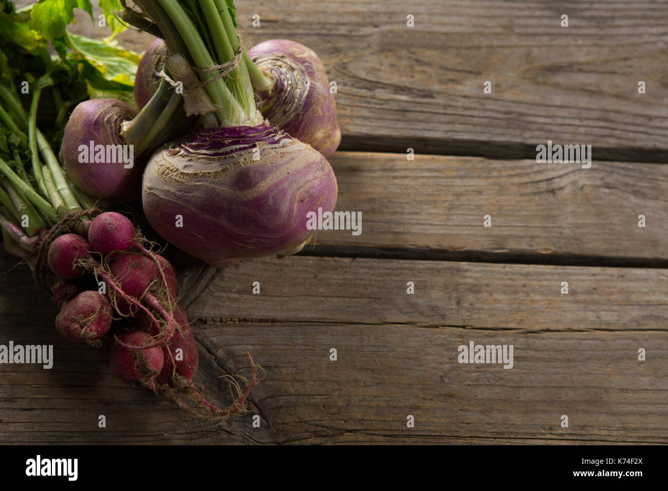 Close-up of beetroot and turnip on wooden table Stock Photo