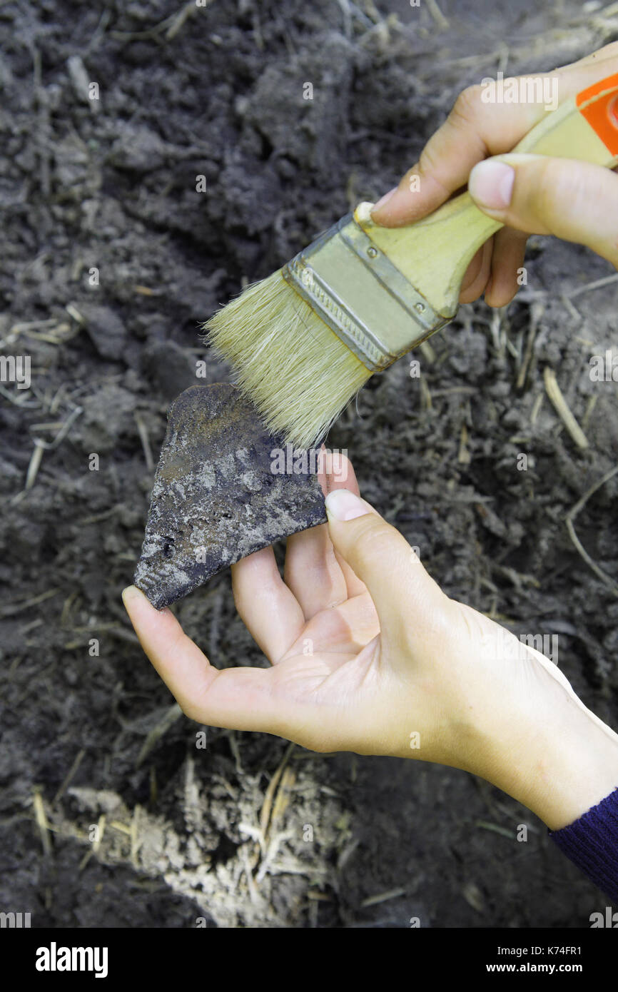 Archaeological find a fragment of ancient ceramic vessel , sharpness