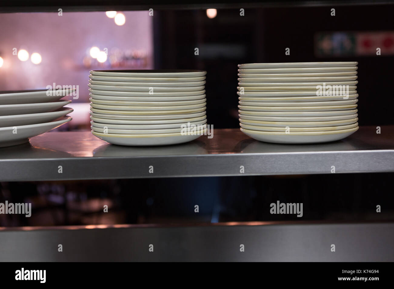Stack of plates in restaurant hires stock photography and images Alamy
