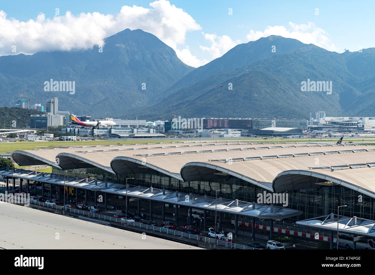 Lantau, Hong Kong  - September 11, 2017 :  Airplane landing at Hong Kong International Airport Stock Photo