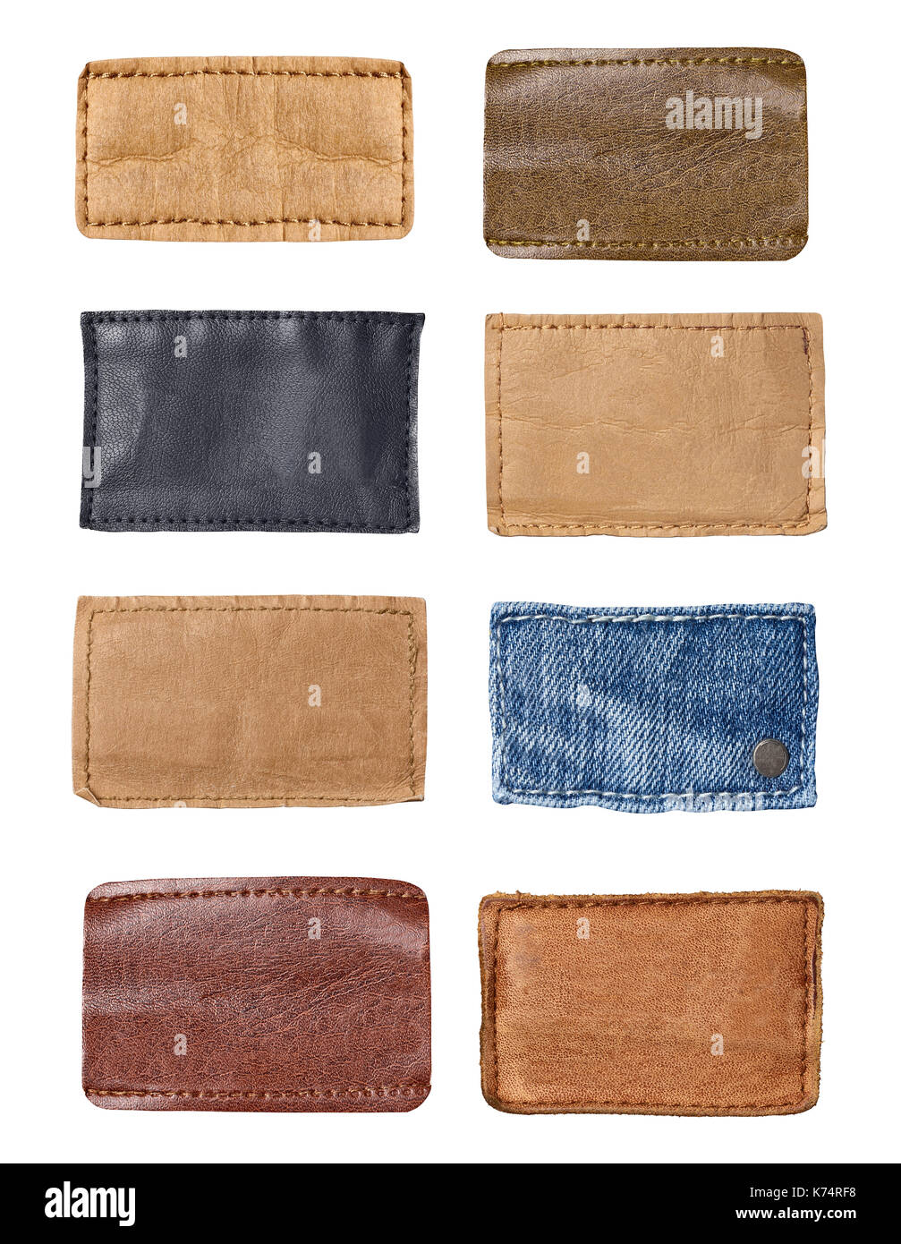 collection of various jeans labels on white background Stock Photo - Alamy