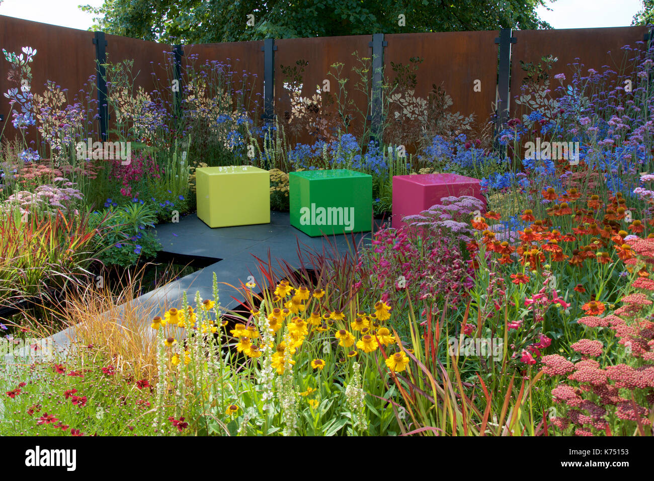 The Colour Box garden at RHS Hampton Court Place Flower Show. The garden was designed by Charlie Bloom and Simon Webster. Stock Photo