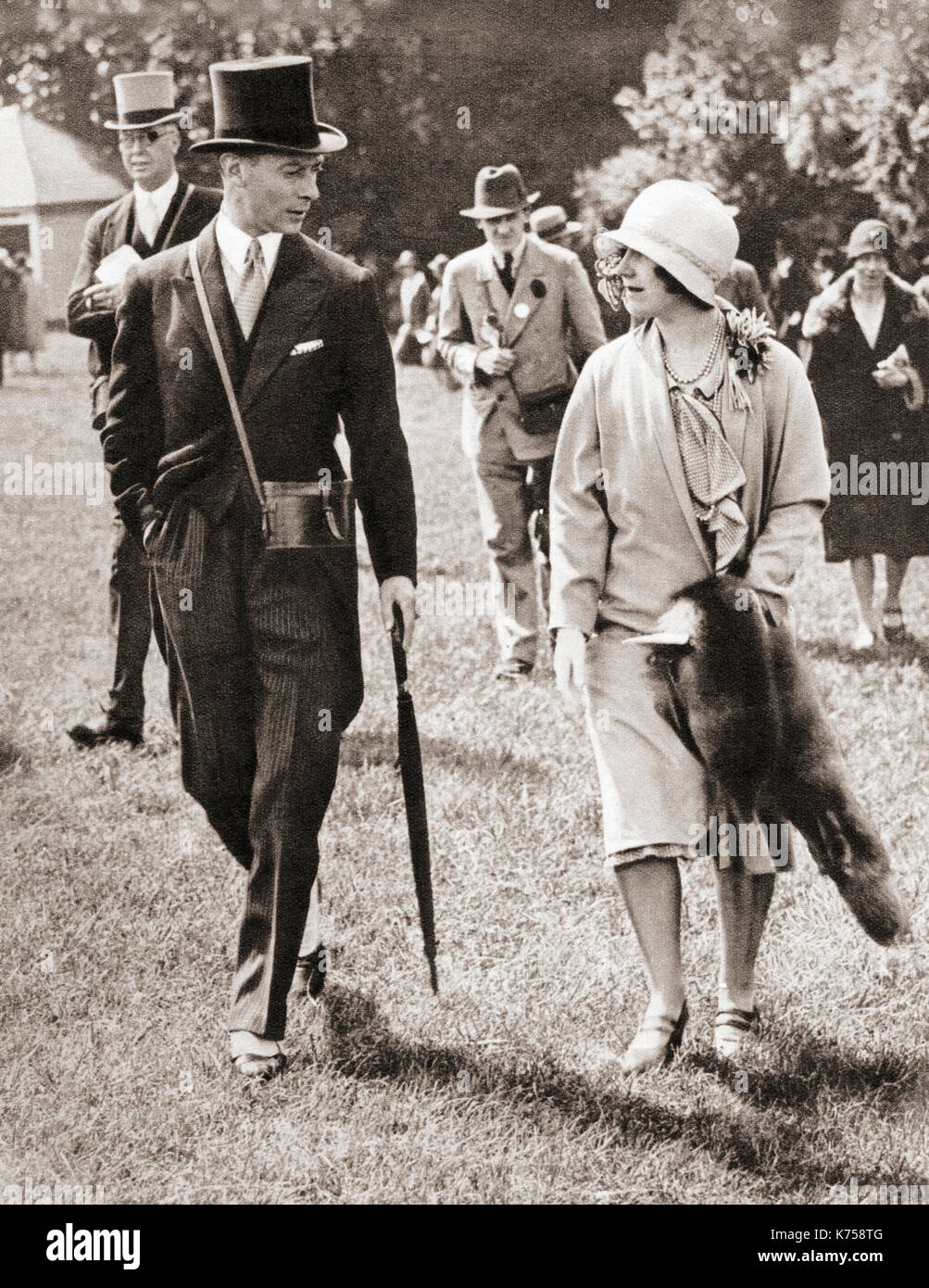 The Duke and Duchess of York at Epsom Racecourse, England in 1928.  Prince Albert, Duke of York, future George VI, 1895 – 1952.  King of the United Kingdom and the Dominions of the British Commonwealth.  Duchess of York, future Queen Elizabeth, The Queen Mother.  Elizabeth Angela Marguerite Bowes-Lyon, 1900 – 2002.  Wife of King George VI and mother of Queen Elizabeth II.  From The Coronation Book of King George VI and Queen Elizabeth, published 1937. Stock Photo