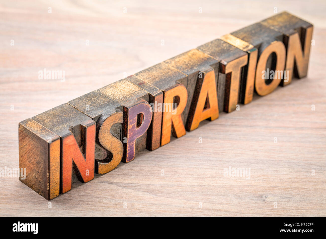 inspiration word abstract in vintage letterpress wood type against grained wood Stock Photo