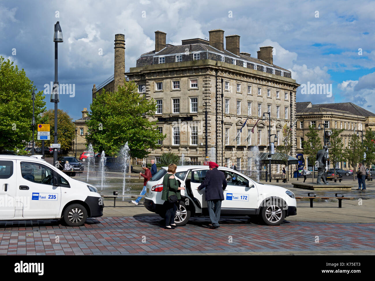 Taxi rank and the George Hotel, Huddersfield, Kirklees, West Yorkshire, England UK Stock Photo