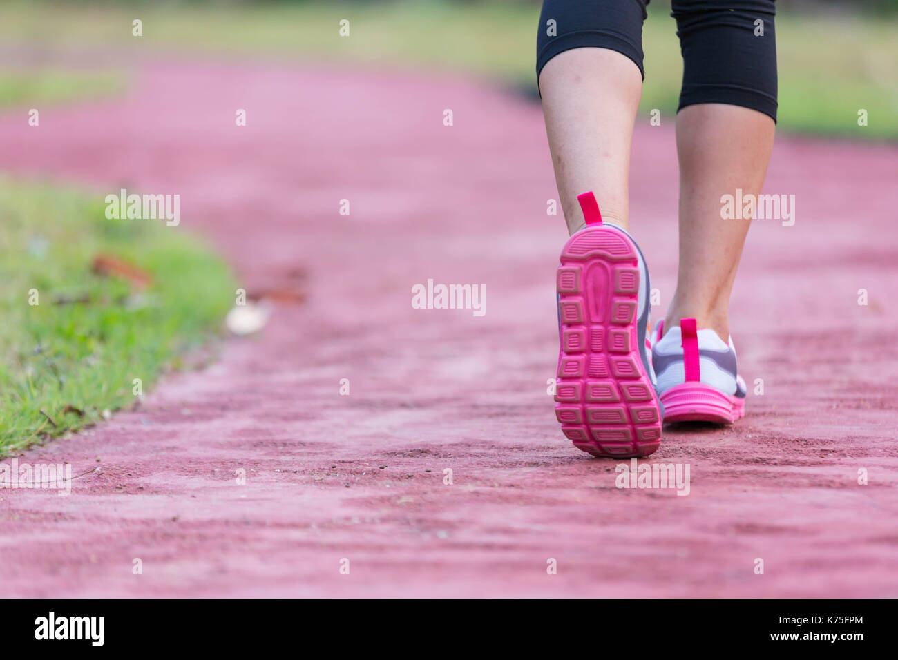 ํYoung fitness woman legs running Stock Photo Alamy