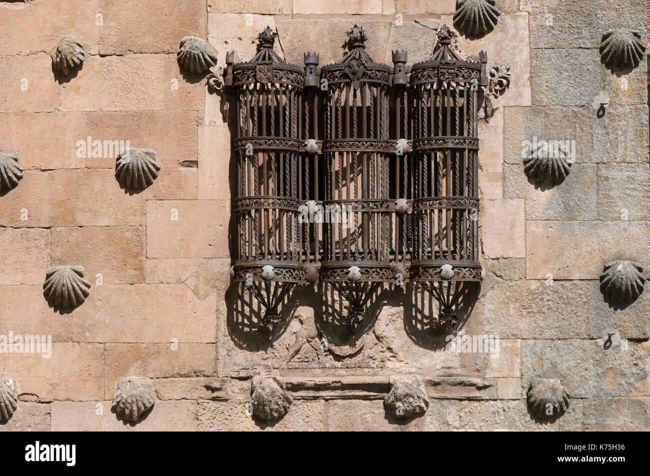 Spain, Castile-Leon, Salamanca, listed as World Heritage by UNESCO, casa de las conchas, wrought iron window Stock Photo
