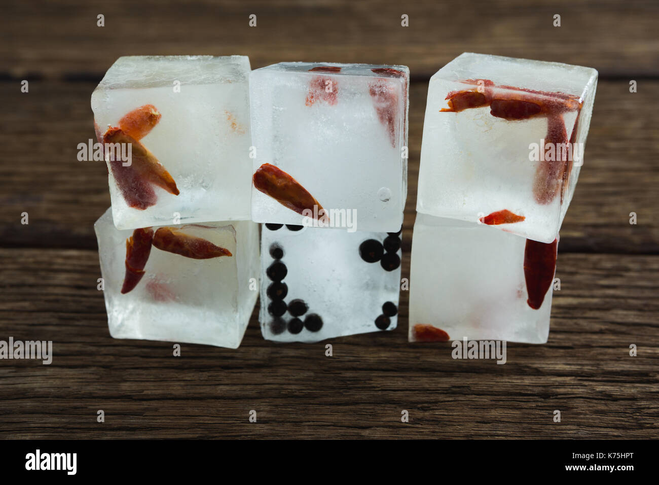 Close-up of flavored ice cubes with herbs Stock Photo