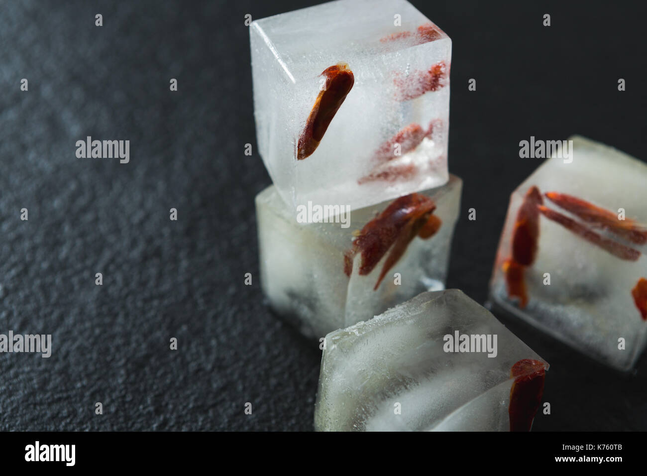 Close-up of flavored ice cubes with spices Stock Photo