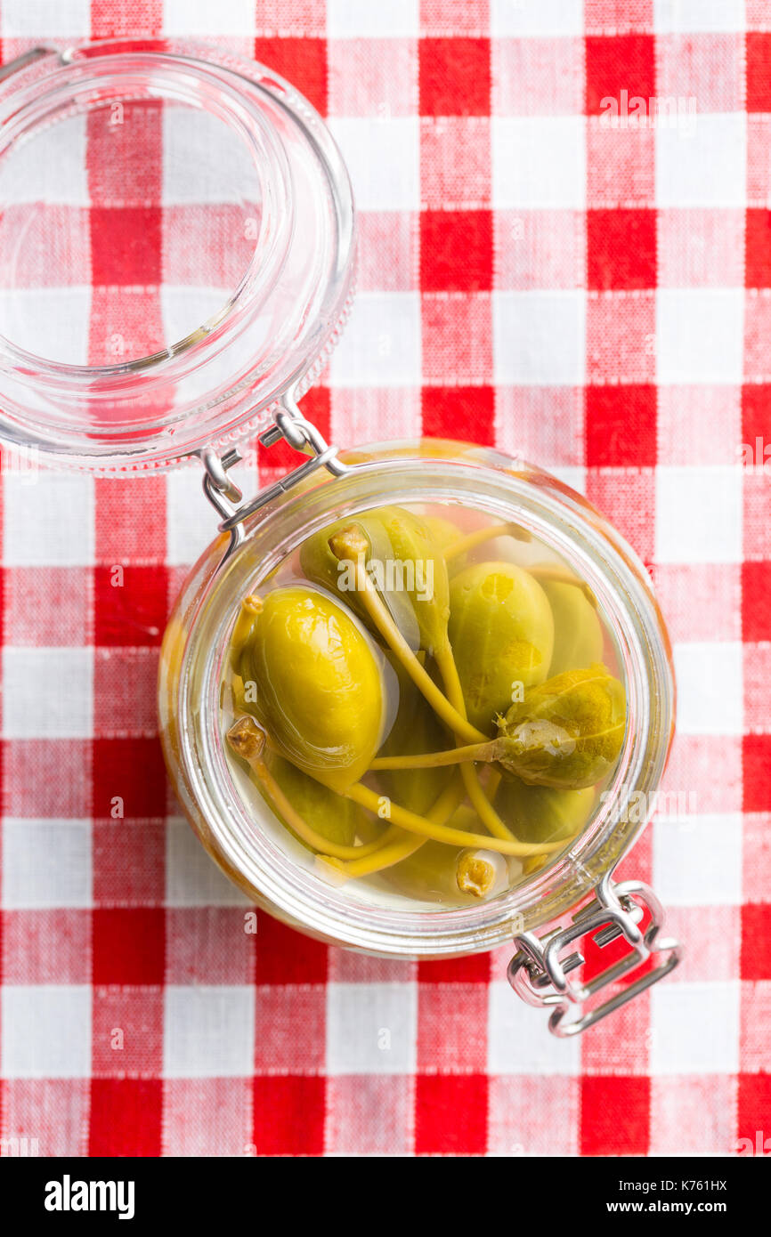 Pickled caper berries in jar. Top view Stock Photo Alamy