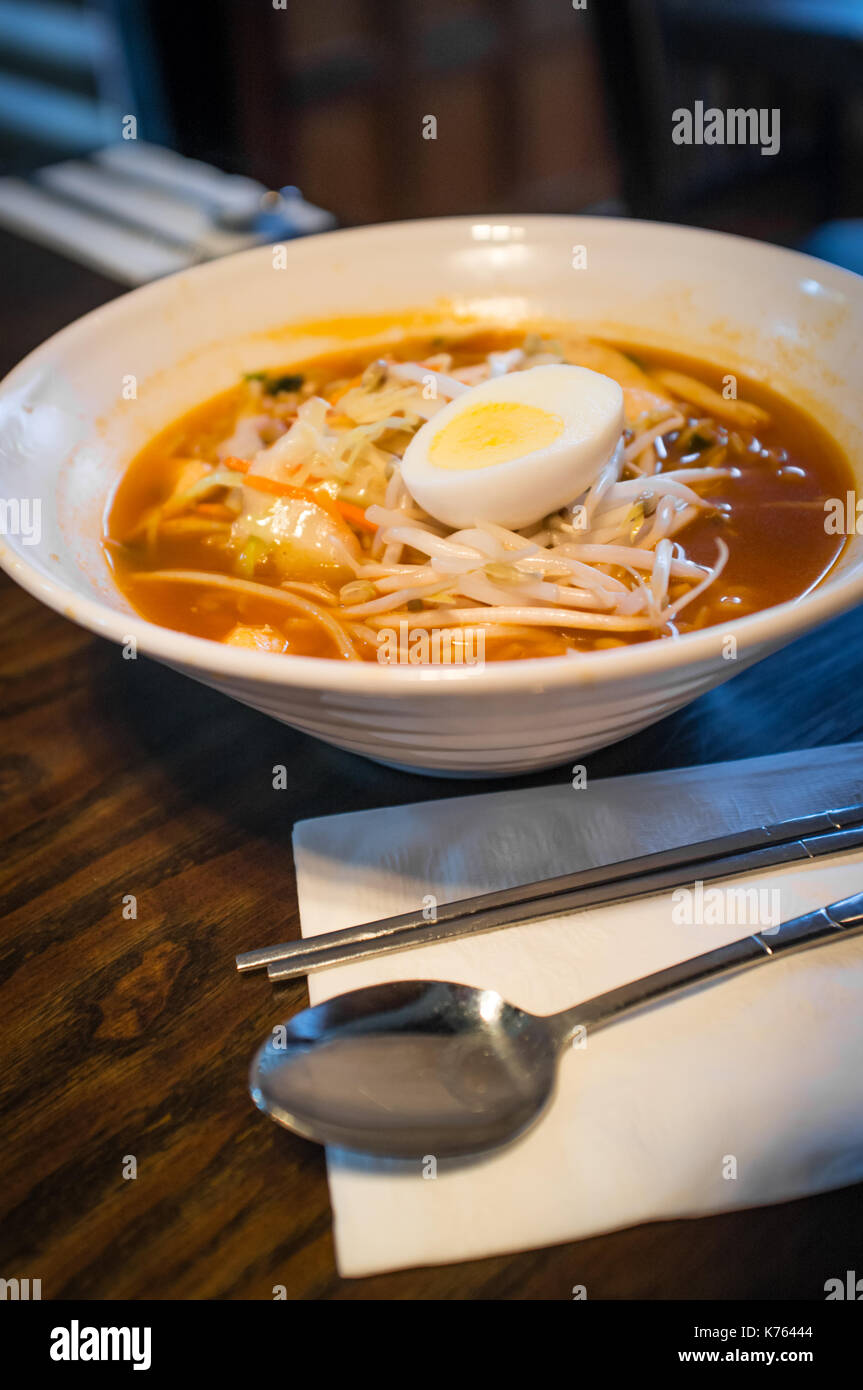 Spicy Korean ramen with mung bean sprouts and hard boiled egg Stock