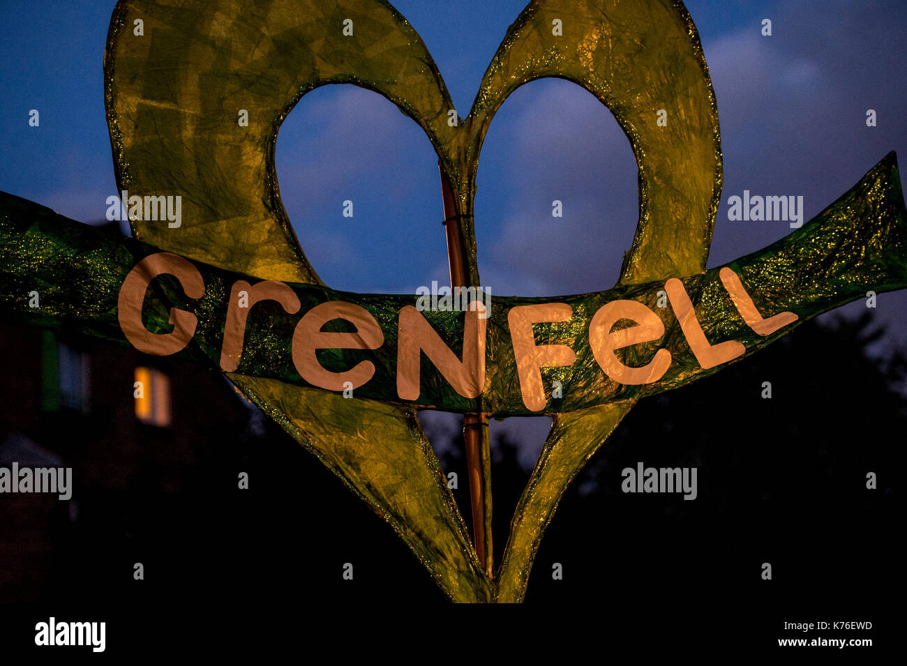 A banner during a silent march for Grenfell Tower fire victims in west London. Stock Photo