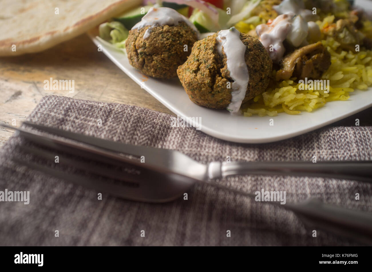 NYC street style Halal chicken and yellow rice with falafel and pita