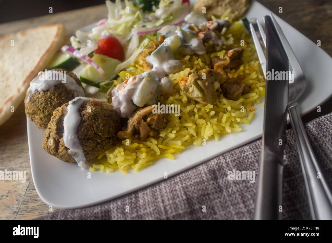 NYC street style Halal chicken and yellow rice with falafel and pita