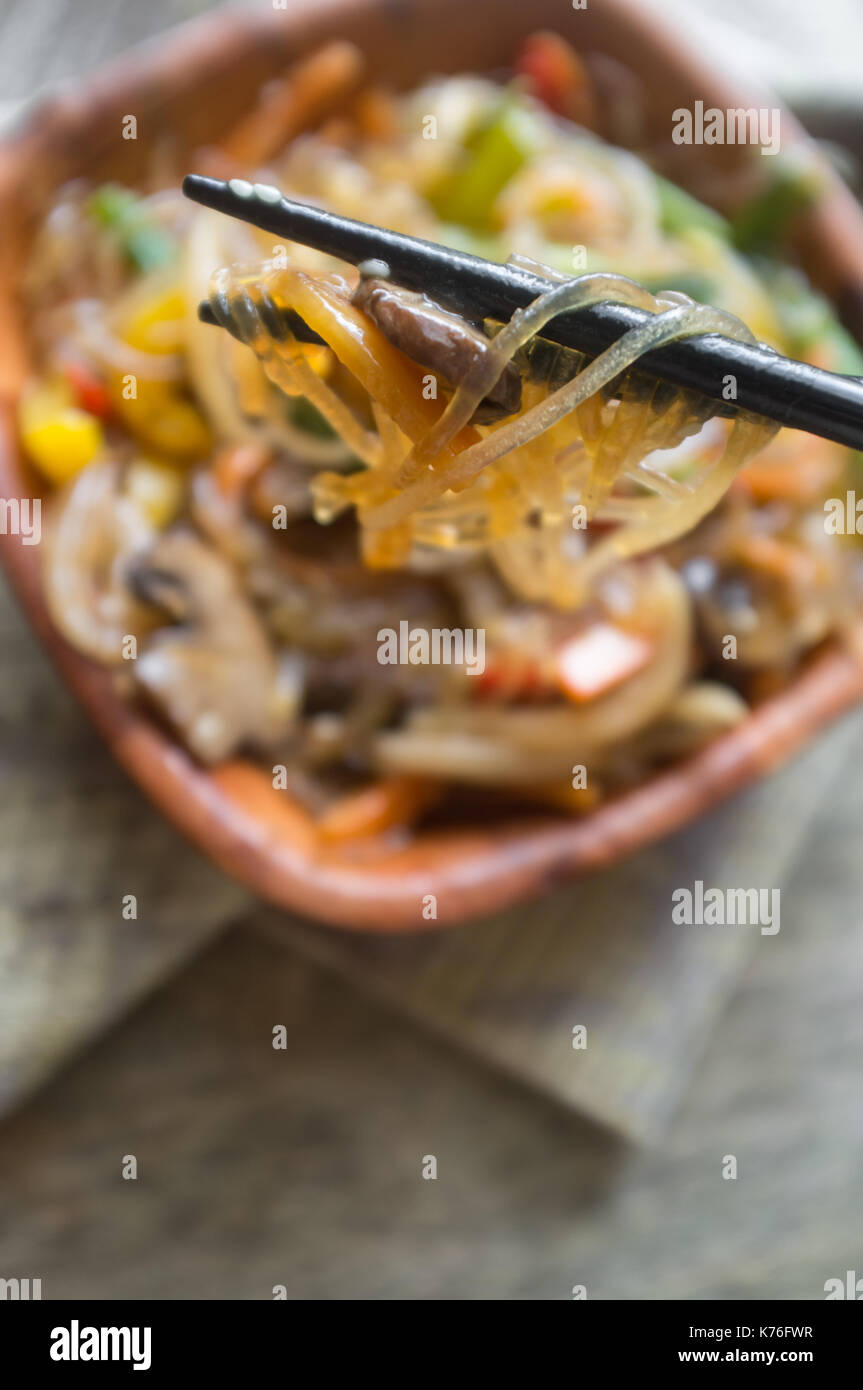 Korean Japchae vegetarian stir fried cellophane noodles with vegetables