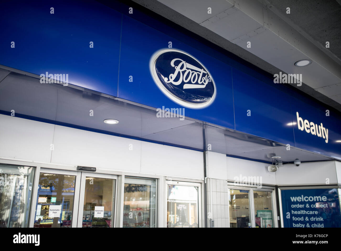 Boots superstore sign and fascia outside the Frenchgate Centre, Doncaster, United Kingdom Stock Photo