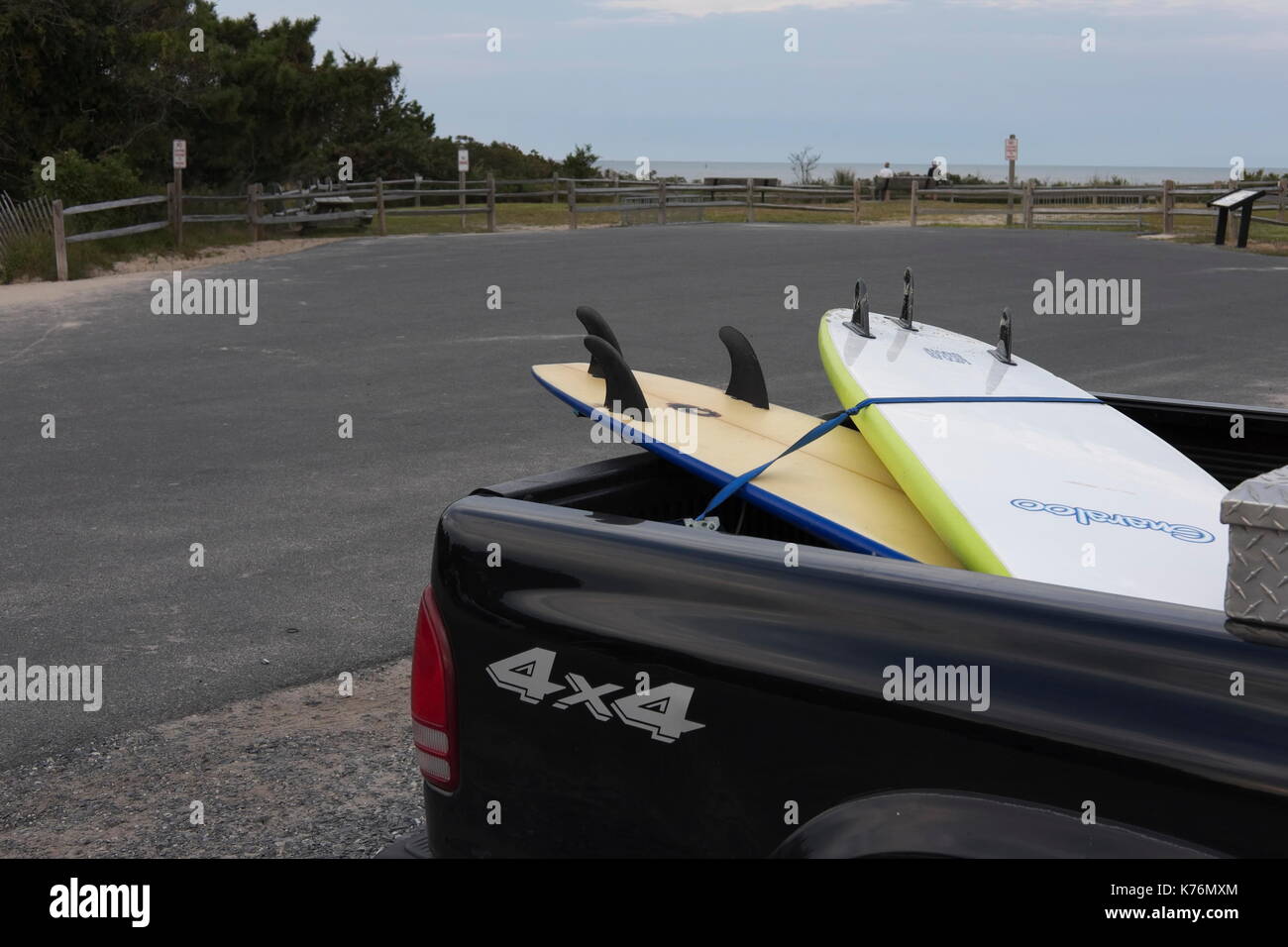 Two surfboards tied onto a black pickup truck Stock Photo Alamy