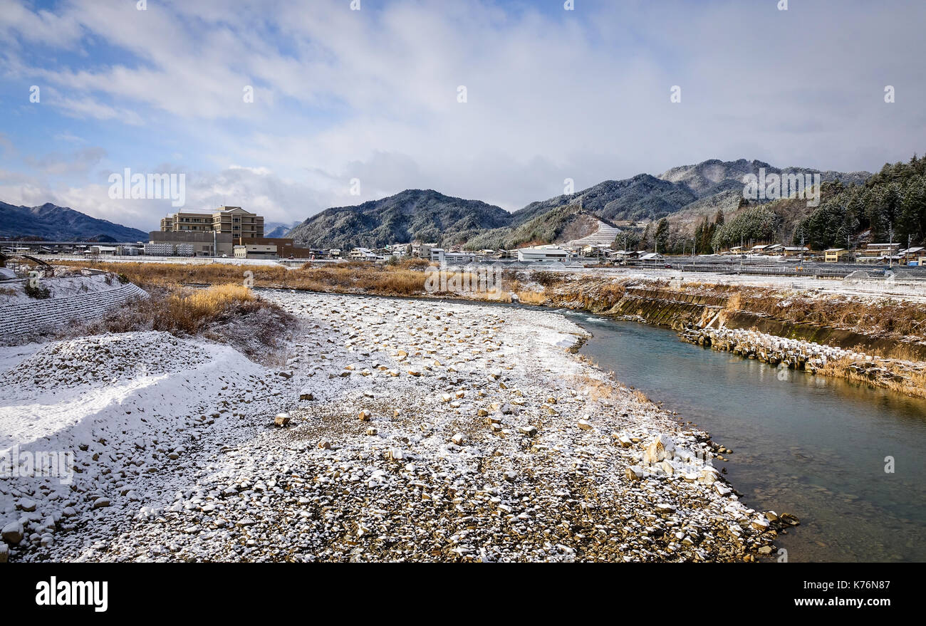 Landscape of winter with river in Nagano, Japan. Nagano Prefecture (Nagano-ken) is a landlocked prefecture of Japan located in the Chubu region. Stock Photo