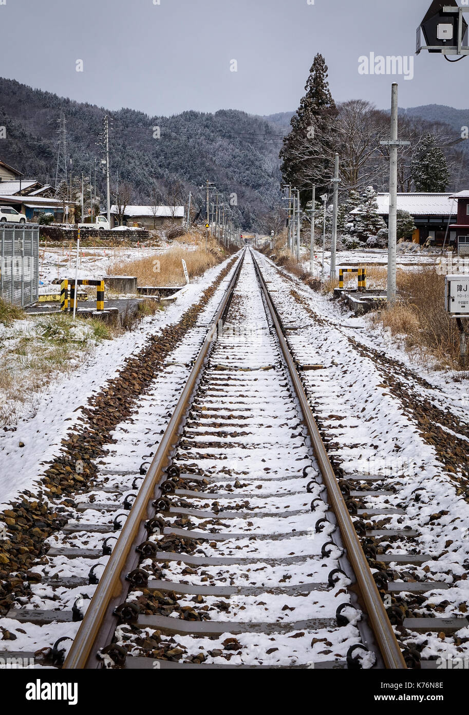 A railtrack at winter in Nagano, Japan. Nagano Prefecture (Nagano-ken) is a landlocked prefecture of Japan located in the Chubu region. Stock Photo