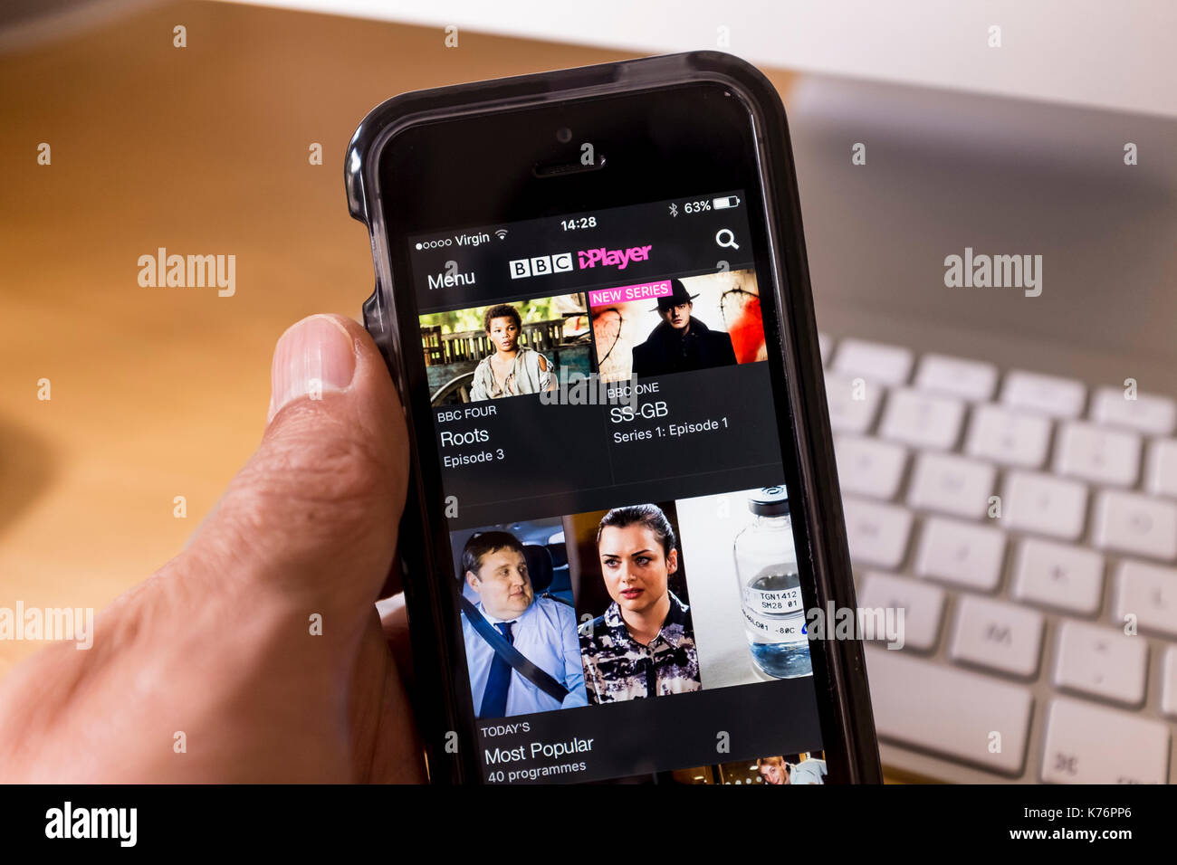 BBC iPlayer home screen viewed on iPhone SE smartphone Stock Photo