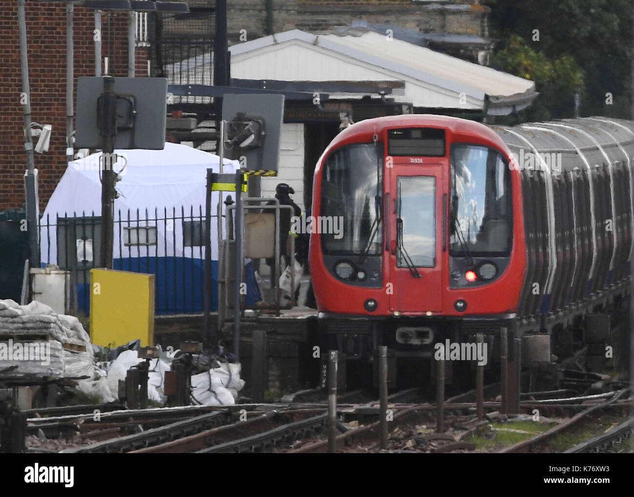 A forensic tent on the platform at Parsons Green station in west London after Scotland Yard declared a terrorist incident following a blast which sent a 'fireball' and a 'wall of flame' through a packed London Underground train. Stock Photo