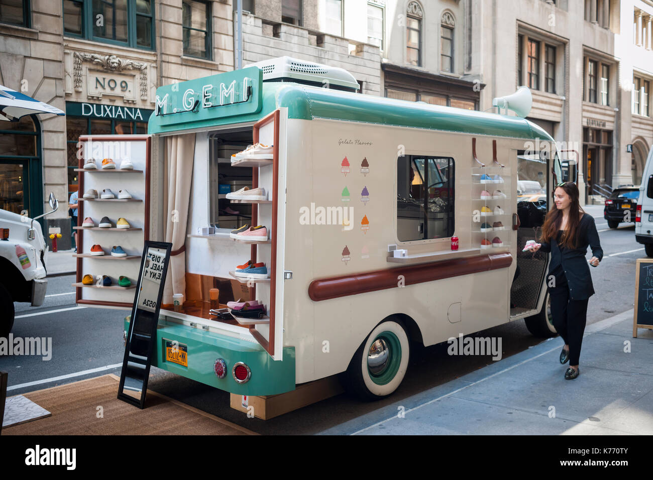A Customized Ice Cream Truck Is Parked Outside Of A Pottery Barn