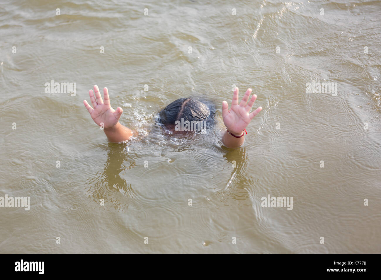 Drowning child hires stock photography and images Alamy