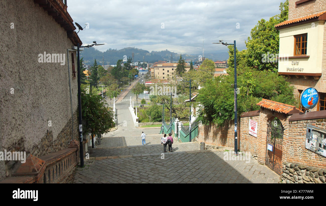 People walking along La Escalinata along the river Tomebamba in the city of Cuenca Stock Photo