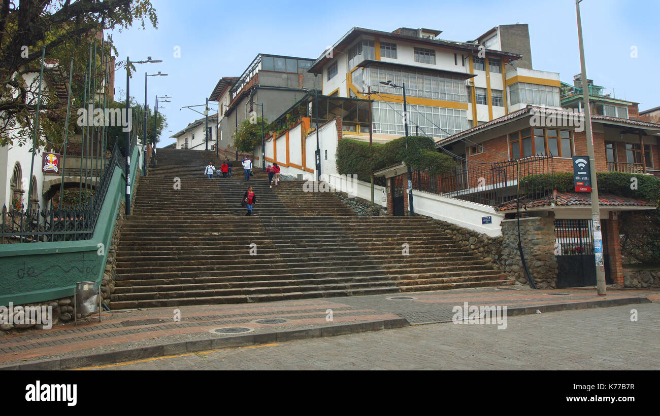 People walking along La Escalinata along the river Tomebamba in the city of Cuenca Stock Photo