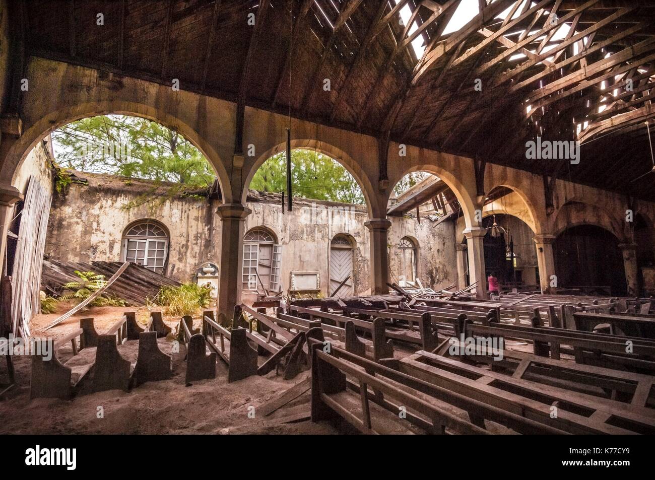 United Kingdom, Montserrat, English-speaking Caribbean, Plymouth, view of the ancient capital, destroyed by pyroclastic flows from the eruption of the stratovolcano of Soufriere Hills in 1997, today prohibited area because of the daily activity of the volcano and its toxic emanations, here a church Stock Photo