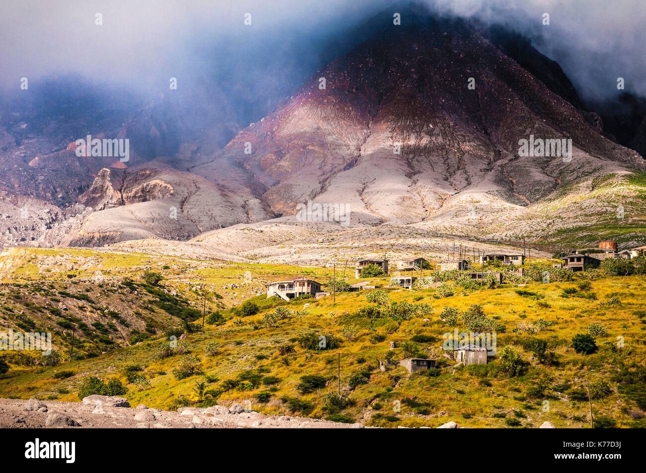 United Kingdom, Montserrat, English-speaking Caribbean, Plymouth, view of the ancient capital, destroyed by pyroclastic flows from the eruption of the stratovolcano of Soufriere Hills in 1997, today prohibited area because of the daily activity of the volcano and its toxic emanations Stock Photo