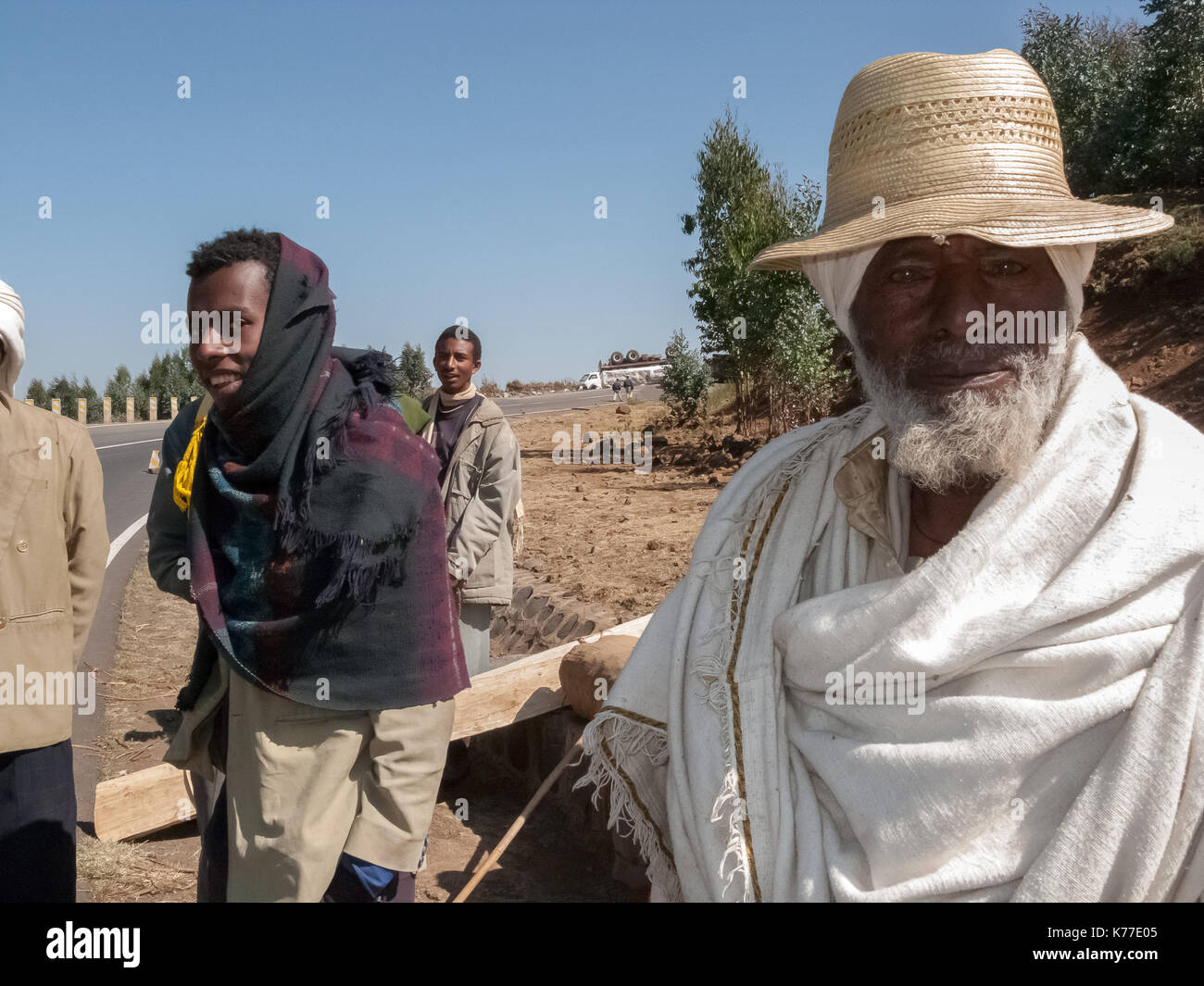 Group of local men by the Addis-Goha Tsion Road, Ethiopia Stock Photo ...