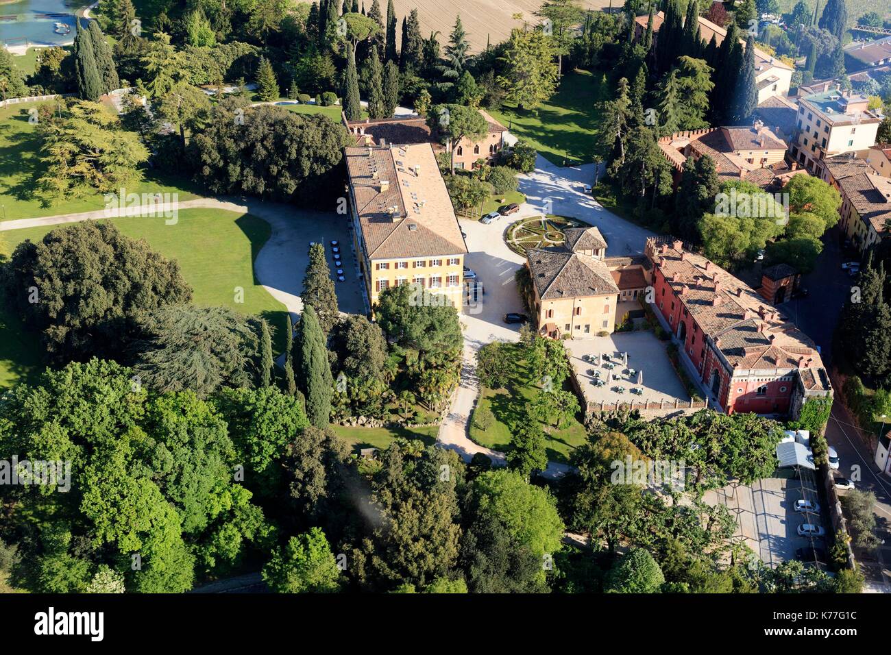 Italy, Veneto, Province of Verona, Cola di Lazise, ??Villa dei Cedri (aerial view) Stock Photo