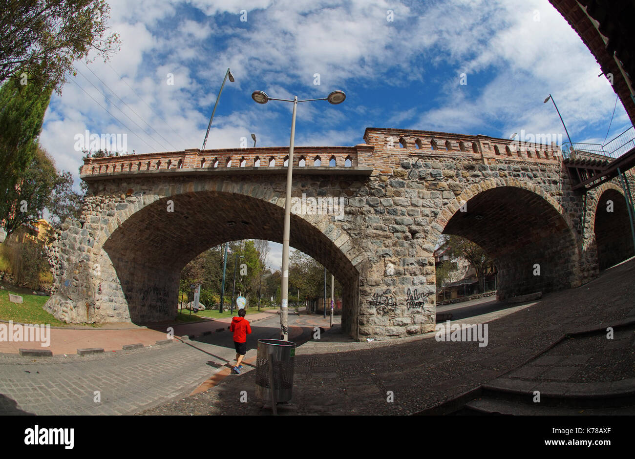 View of the broken bridge, one of the main tourist sites of the city of Cuenca. Wide angle Stock Photo