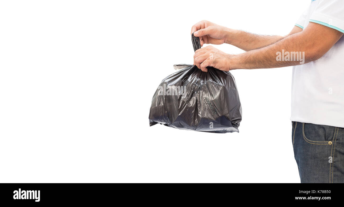 Man hands holding garbage bag isolated on white background Stock Photo