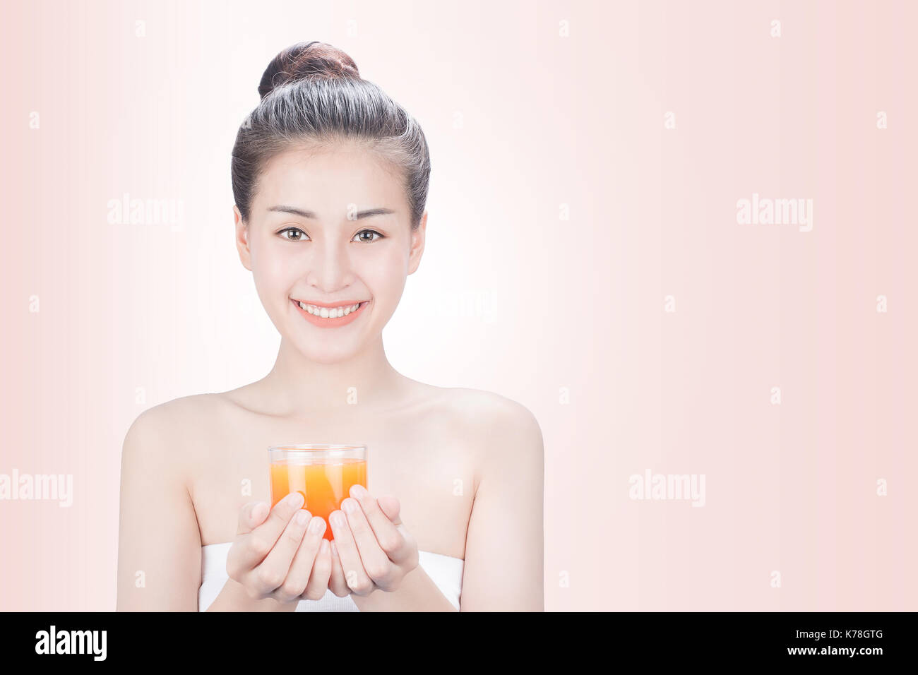 Women drink orange juice Stock Photo