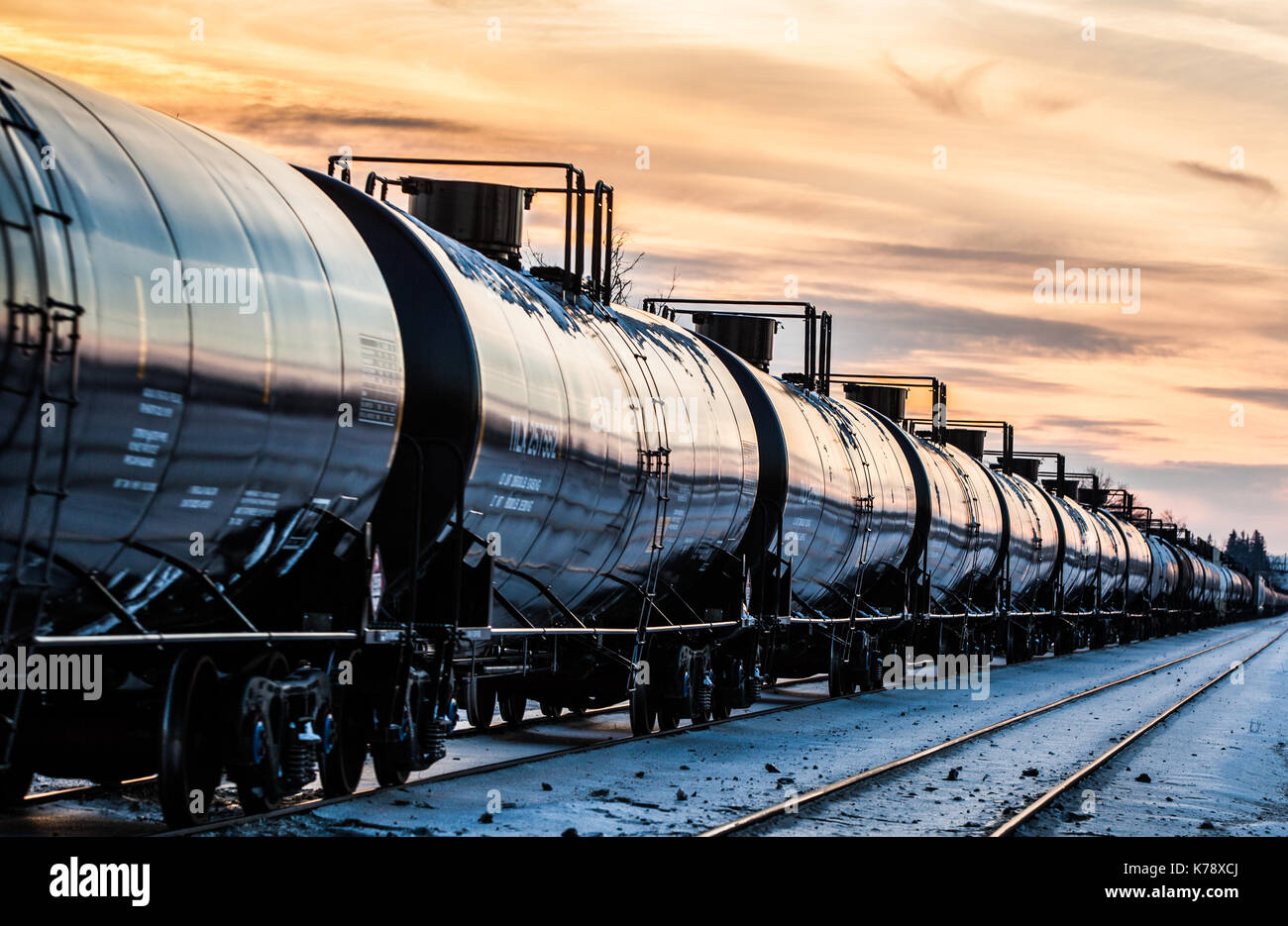 shot this train pulling all these oil tankers one evening in the winter,, Stock Photo
