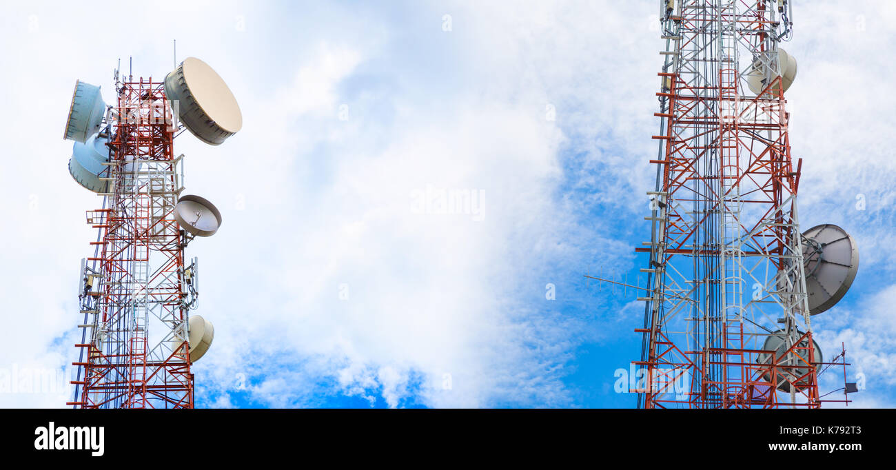 Large telecommunication tower against sky and clouds in background .  Internet network connection concept Stock Photo - Alamy