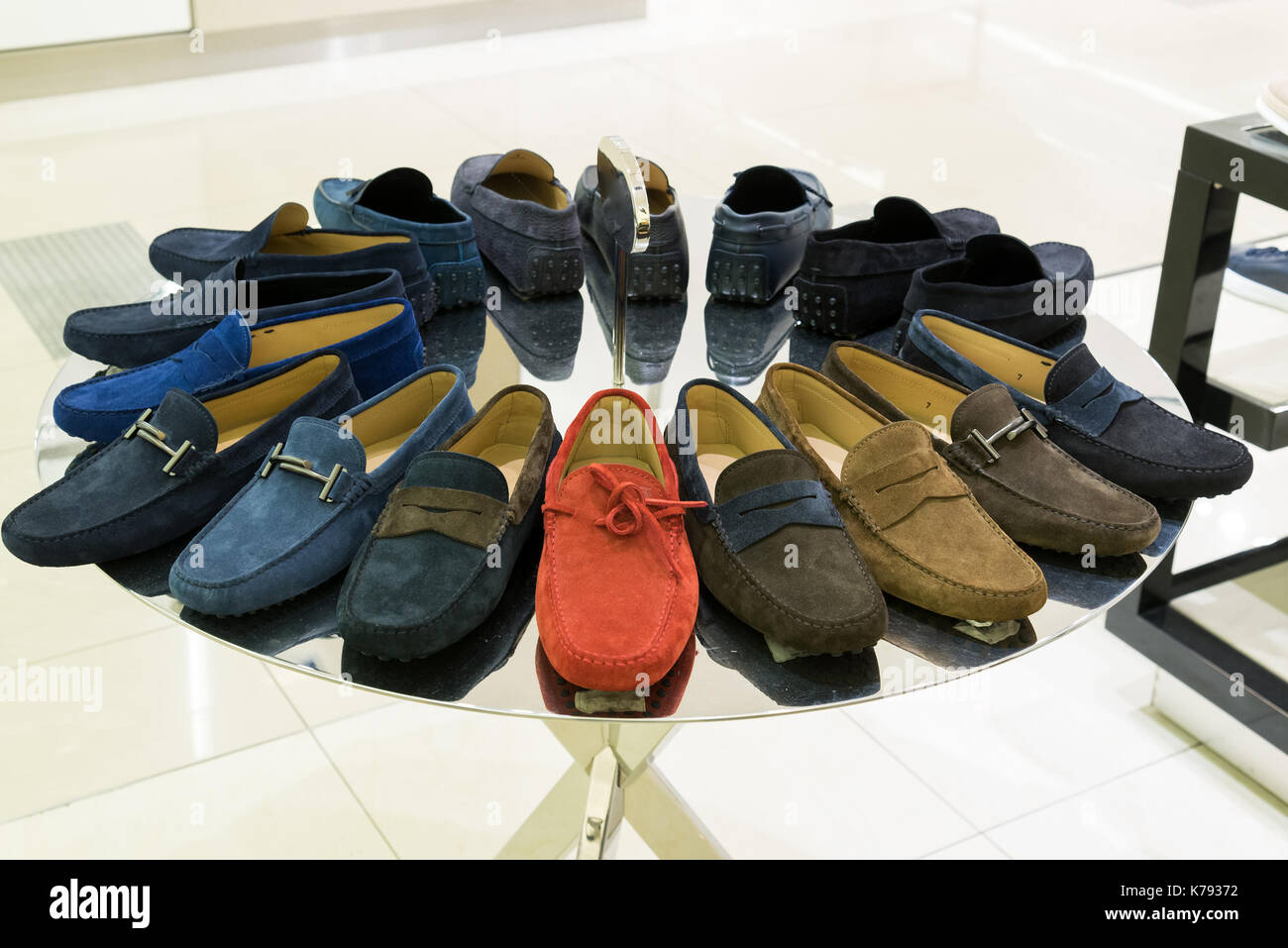 Mens suede summer shoes in store Stock Photo